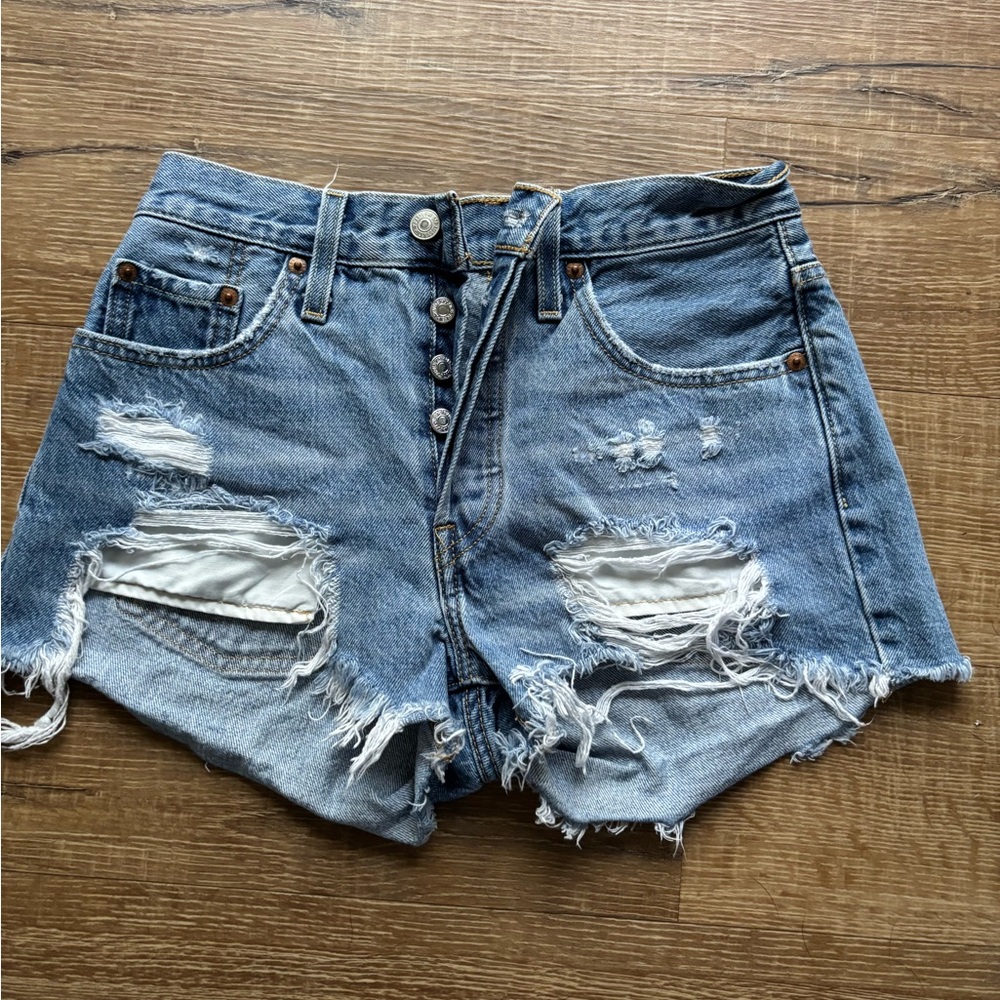 Levi's Blue Jean Shorts with Distressing and High-Waisted Style